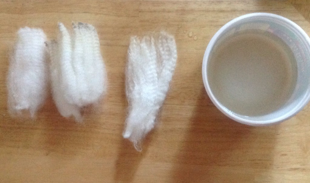 Pictured from left to right, clean white control lock (what I'm aiming for, dirty lock pre hydrogen peroxide, and post HP soak