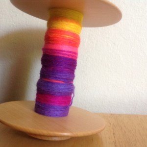 First bobbin of rolags, spun thin. 3 rolags 