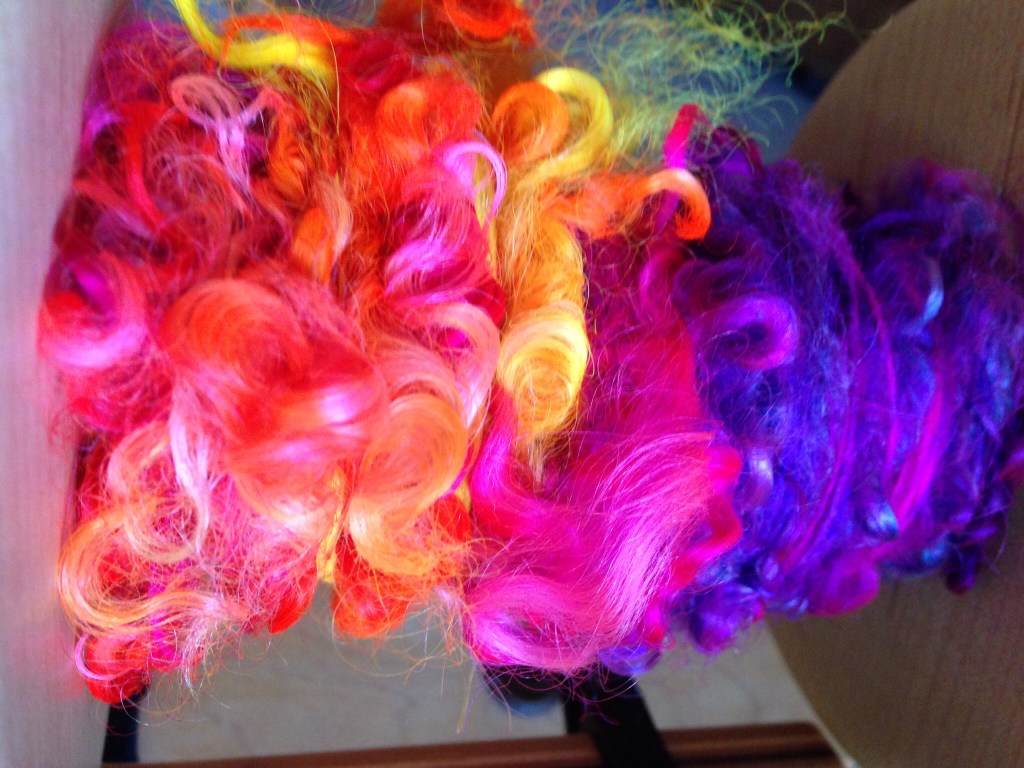 Rolags with teeswater locks spun in I love the silky locks